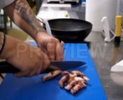 Get 100&#39;s of FREE Video Templates, Music, Footage and More at Motion Array: https://www.bit.ly/2UymF81nnnnGet this here: https://motionarray.com/stock-video/chef-cutting-seafood-135525nnChef Cutting Seafood is an interesting and vibrant stock video presenting a closeup of seafood being cut by a chef in a restaurant kitchen. The chef cuts the octopus into bite-size pieces on a bright blue chopping board. Use this clip as a supplemental footage for cooking shows, food-related vlogs, mobile applica