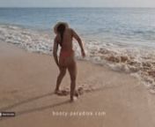 Sexy black-haired latina girl with bubble butt washes the sand from her gorgeous booty in the surf of the sea from sexy girl booty