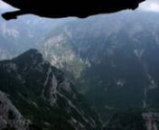Robert carves his V4 (wingsuit) through the beautifull European mountain landscape .nnwww.phoenix-fly.comnwww.adrenalinbase.com