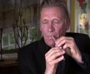 English: Danish multitalented musician (clarinet, piano etc) Peter Bastian plays Bulgarian folk music on a simple straw. He originally made the straw (cut holes in it) for a children&#39;s television program back in the 80&#39;es and has kept it in a wooden box ever since.nHe has published the book
