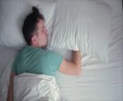 Stomach Sleeping , May Be Wreaking , Havoc on Your Health.&#60;br/&#62;&#39;New York Post&#39; reports that sleeping &#60;br/&#62;on your stomach may come with &#60;br/&#62;a number of potential health issues.&#60;br/&#62;Experts say the biggest complaint &#60;br/&#62;from people who sleep on their &#60;br/&#62;front is having lower back pain.&#60;br/&#62;If you already have &#60;br/&#62;neck and back problems, &#60;br/&#62;sleeping in this position &#60;br/&#62;is almost guaranteed &#60;br/&#62;to make them worse, Dr. Tony Nalda,Scoliosis Reduction Center, via New York Post.&#60;br/&#62;According to Dr. Tony Nalda from the Scoliosis &#60;br/&#62;Reduction Center, stomach sleeping can also make &#60;br/&#62;breathing difficult as it compresses the diaphragm.&#60;br/&#62;The sleeping position also puts &#60;br/&#62;stress on the heart, which can make it &#60;br/&#62;more difficult for blood to circulate.&#60;br/&#62;Over time, this increases the &#60;br/&#62;risk of cardio issues, especially &#60;br/&#62;if you already have problems. &#60;br/&#62;If you struggle to breathe deeply, &#60;br/&#62;it can lead to higher blood pressure, Dr. Tony Nalda,Scoliosis Reduction Center, via New York Post.&#60;br/&#62;Over time, this increases the &#60;br/&#62;risk of cardio issues, especially &#60;br/&#62;if you already have problems. &#60;br/&#62;If you struggle to breathe deeply, &#60;br/&#62;it can lead to higher blood pressure, Dr. Tony Nalda,Scoliosis Reduction Center, via New York Post.&#60;br/&#62;Sleeping with a twisted neck, like in the front &#60;br/&#62;sleeping position, can also result in migraines, &#60;br/&#62;pinched nerves and even neurological issues.&#60;br/&#62;According to the Sleep Foundation, stomach &#60;br/&#62;sleeping can also lead to more wrinkles because of &#60;br/&#62;how the position smushes your face against the pillow.&#60;br/&#62;The experts say that changing sleeping &#60;br/&#62;positions can be an easy fix that could improve &#60;br/&#62;both your quality of sleep and your health.&#60;br/&#62;Sleeping on your back or &#60;br/&#62;your side offers significantly &#60;br/&#62;more health benefits and less &#60;br/&#62;discomfort than sleeping &#60;br/&#62;on your stomach, Sleep Foundation, via New York Post.&#60;br/&#62;Experts say that side sleeping can help &#60;br/&#62;people who suffer from sleep apnea, &#60;br/&#62;as the position helps keep the airway open.&#60;br/&#62;Meanwhile, sleeping on your back &#60;br/&#62;can help people with lower back pain, &#60;br/&#62;as it helps with spine alignment