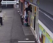 A woman got stuck to a shop shutter and was raised several feet into the air in a hilarious viral video that has left viewers &#92;