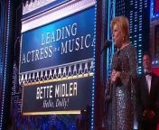 See Glenn Close present Bette Midler with the Tony Award for Best Performance By An Actress In A Leading Role In A Musical for her work in Hello, Dolly!