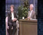 Robin Williams and shows archive footage of his first Tonight Show appearance with then-host Johnny Carson.