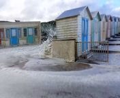 Sea foam washes into Bude following strong storms and harsh seas