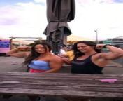 Watch Two Ladies Flexing Arm Muscles_Public Event from muscular