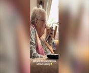 A video shows the hilarious moment a racing-mad grandmother found out she had won a bet on the Grand National.