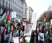 People take part in a pro-Palestine march in central London during a national demonstration for ceasefire in Gaza. Demonstrators marched from Hyde Park Corner to the US Embassy in London.