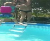 This mom decided to playfully throw her son into the pool. But as he got terrified, she stopped herself from doing so. However, as she was already leaning in, she received instant karma and tumbled over the side, causing the kids to laugh out loud.