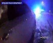Dramatic body cam video shows heroic City of Spokane Police Department officer smash out window, and with help from bystander, pull woman out of burning vehicle.