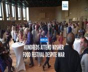 Crowds gathered at the Jewish food festival despite overnight attacks on Israel.