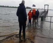 Members of the Rotary Club of Rutland and the Rotary Club of Uppingham encountered a slightly submerged jetty at at Rutland Sailing Club. They visited Rutland Sailability, a charity receiving their donation of a new hoist to help people with limited mobility into and out of sailing boats.