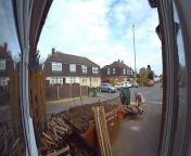 Doorbell footage has captured the hilarious moment a gardener’s wheelbarrow tips backwards, covering him in soil, as he tries to empty soil into a skip.
