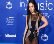 Charli XCX says her new songs are like gossipy text messages.