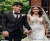 Prompt Midjourney : A photo of an Asian couple, the man is tall and handsome with short hair wearing formal attire holding hands happily walking in front garden, the woman has long curly brown hair wear white wedding dress and veil on her head, with flowers around them, written text &#92;